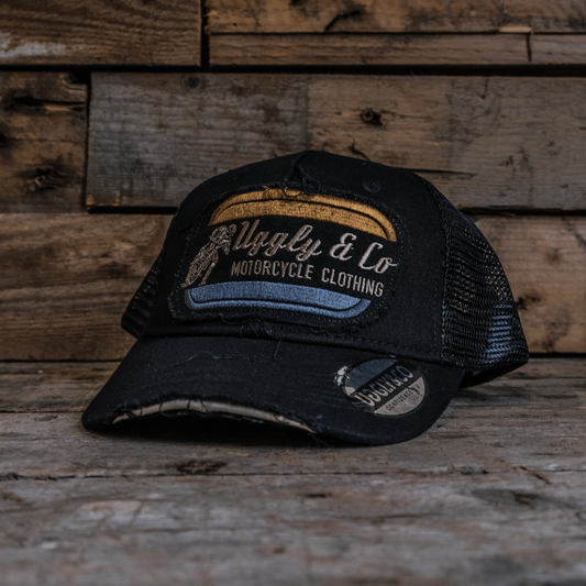 Black Flat Track Trucker Hat by Uggly & Co