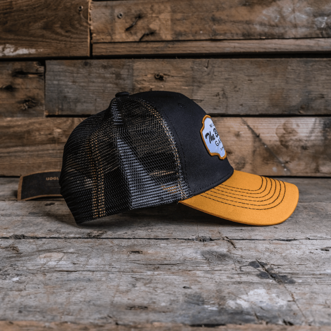 Black & Yellow Black Dub Garage Trucker Hat by Uggly & Co